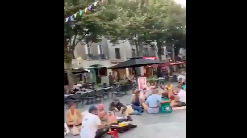 Watch: People Dine Outside French Cafes in Protest of Vaccine Passport Rules