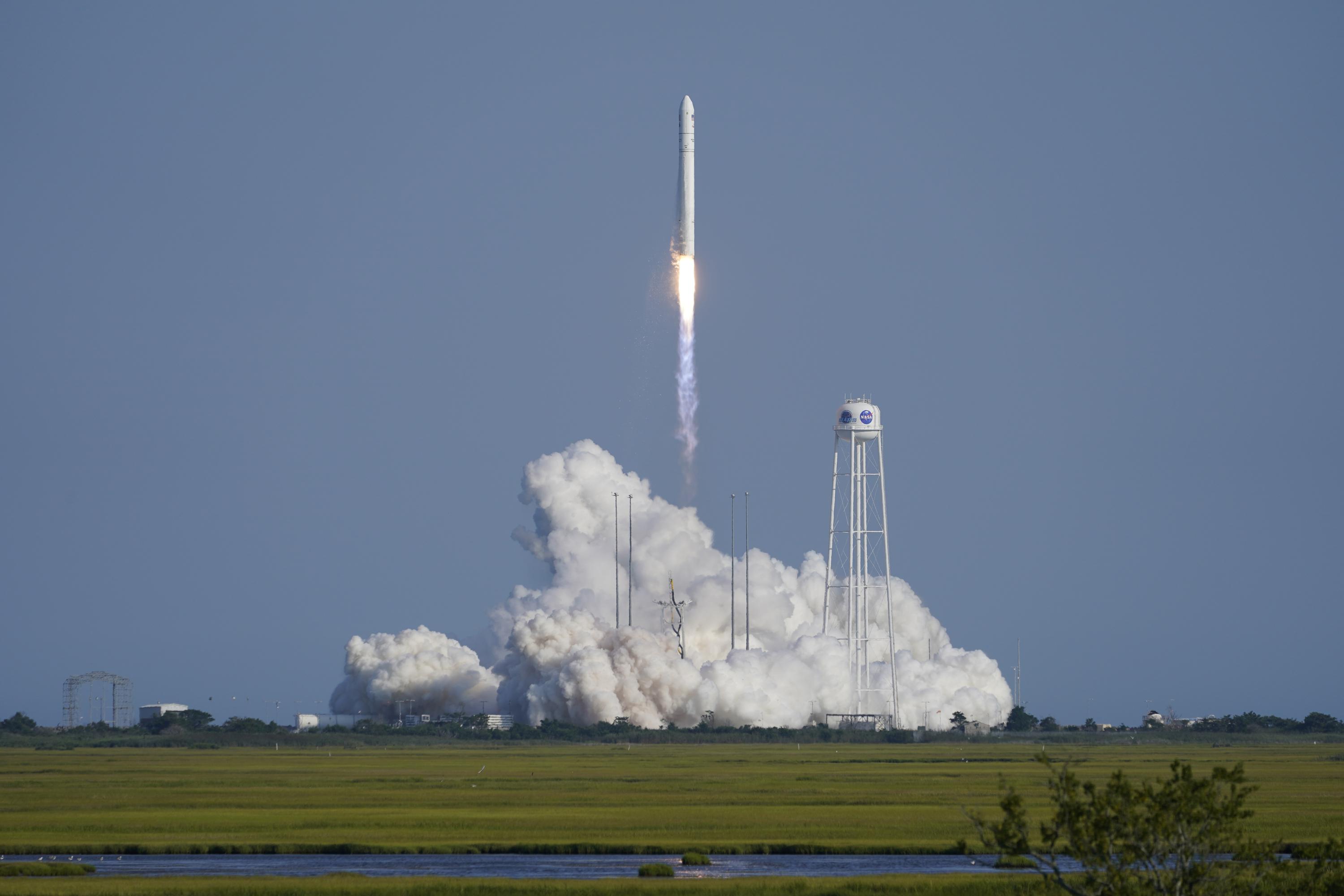 Space station supplies launched with a pizza delivery for 7