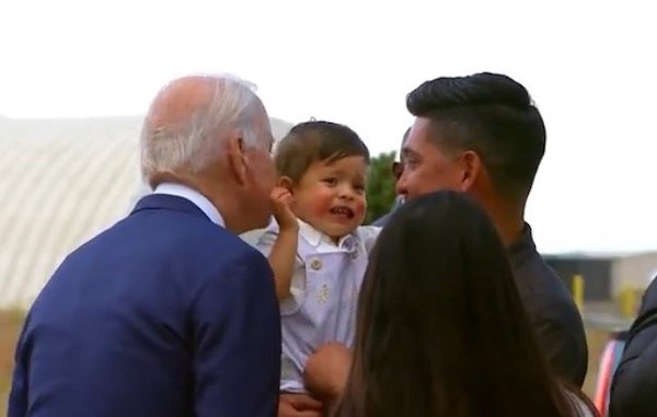 Biden Tries Smooching Young Baby in Colorado, Baby Pulls Back, Slaps Him in Horror