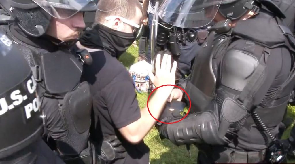 Watch: The Feds Actually Arrest One of Their Own at Staged 'Justice for J6' Rally - Becker News