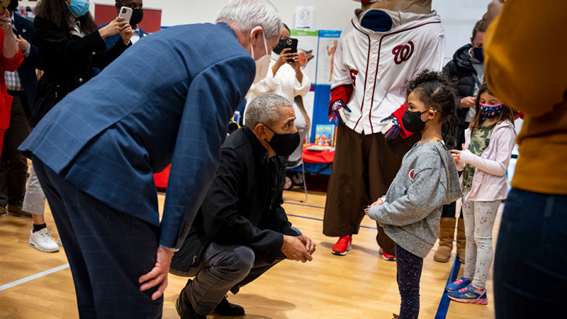 “Predators”: Obama And Fauci Turn Up At Elementary School To Watch Kids Get Vaccinated