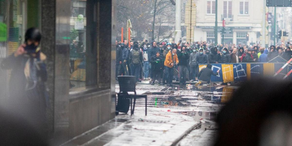 Protests against COVID-19 restrictions turn violent in Brussels - TheBlaze