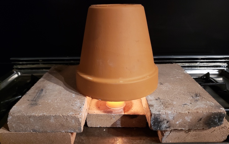 Can a flower pot and tealight candle create enough heat to save you in a cold emergency? – The Prepared