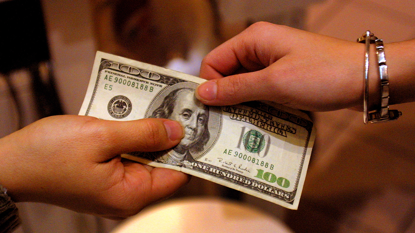 The U.S. is debating whether to adopt a digital dollar : NPR