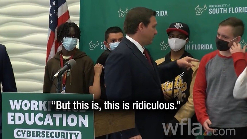 Video: DeSantis Tells Students Standing Behind Him To Take Off “Ridiculous” Masks