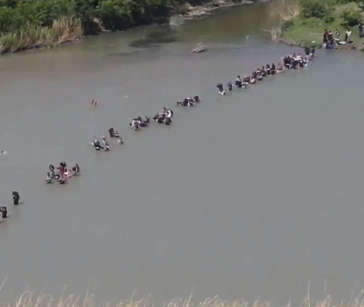This Is What a Wide Open Border Looks Like: Endless Stream of Illegals Wade Across Rio Grande Unimpeded - The Uniparty Supports This
