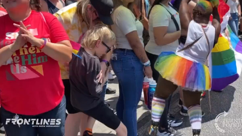 Pride Insanity: Mom Forces Unwilling Child to Watch Gay Festivities As He Recoils in Horror