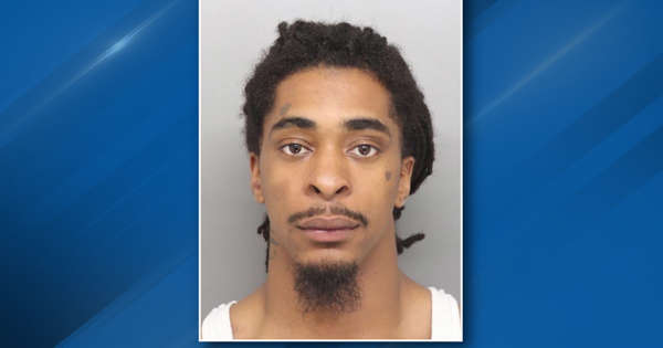 Man arrested, accused of causing internal decapitation of woman found dead