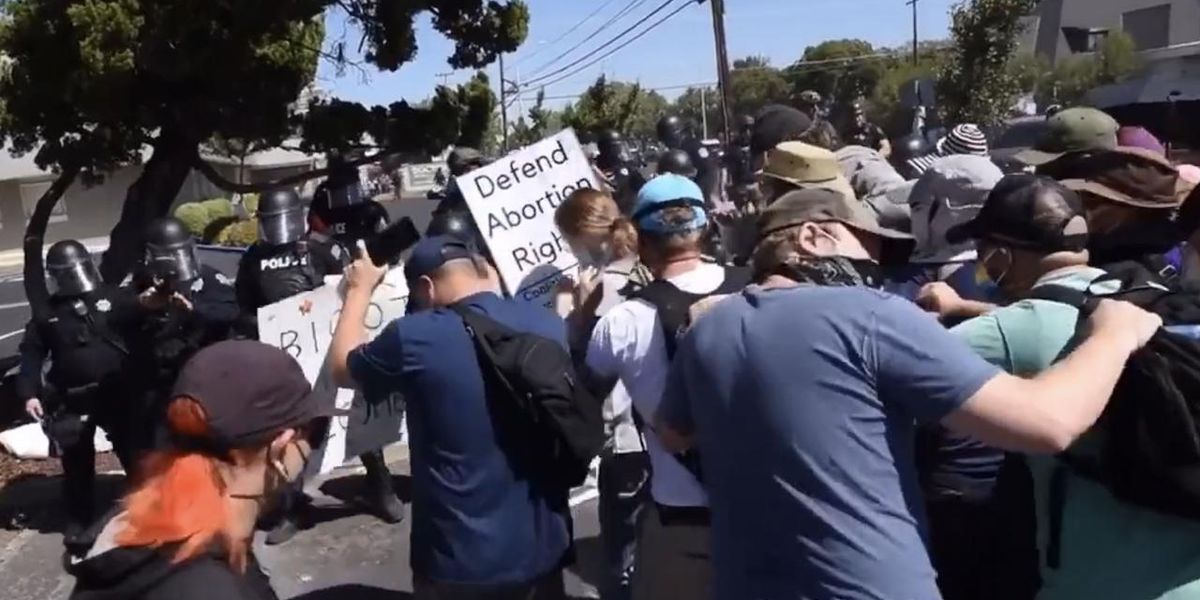 Antifa, radical leftists try to shut down 'straight pride' event. But cops in riot gear fire pepper-spray bullets at enraged, retreating counter-protesters. - TheBlaze