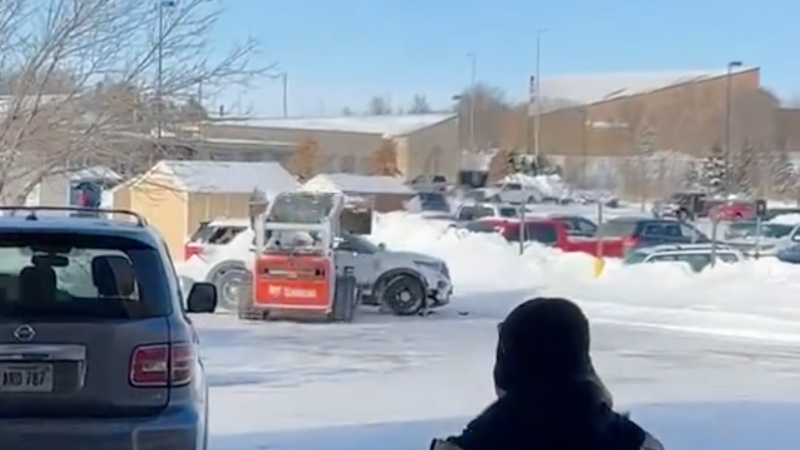 Wild Video: Man Rampaging In Skid Loader Batters Businesses, Cars, Police Cruiser