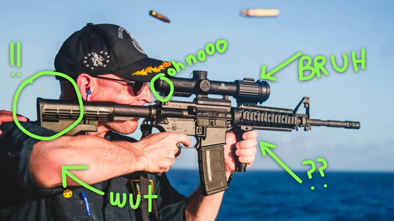 US Navy Deletes Embarrassing Photo Showing Warship Commander  Holding Rifle with Scope Mounted Backwards