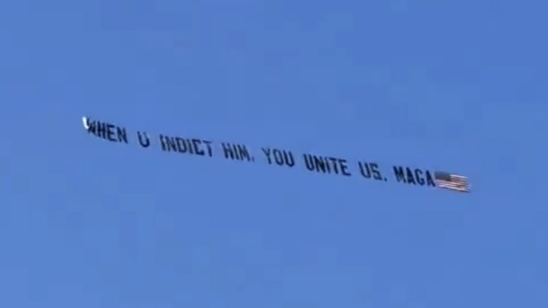 Watch: Plane Flies Over Trump NYC Trial With Banner That Reads ‘WHEN U INDICT HIM YOU UNITE US. MAGA!’