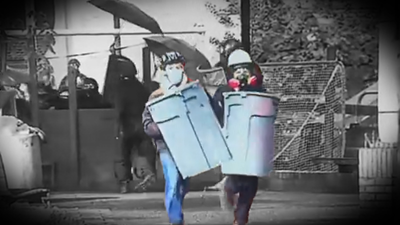Hilarious: Protester At UCLA Tries Ramming Cop With Garbage Can Shield & Gets Dropped!
