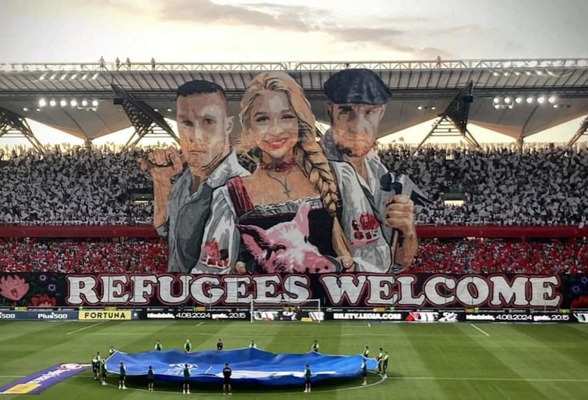Poland: Legia Warsaw ultras ‘welcome’ refugees to Poland with massive banner featuring pig's head and baseball bat